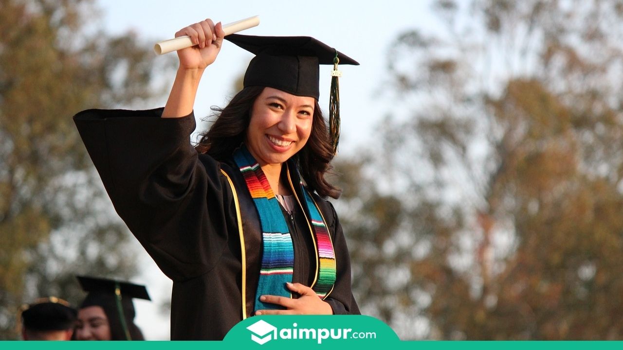 a girl with her diploma certificate aimpur